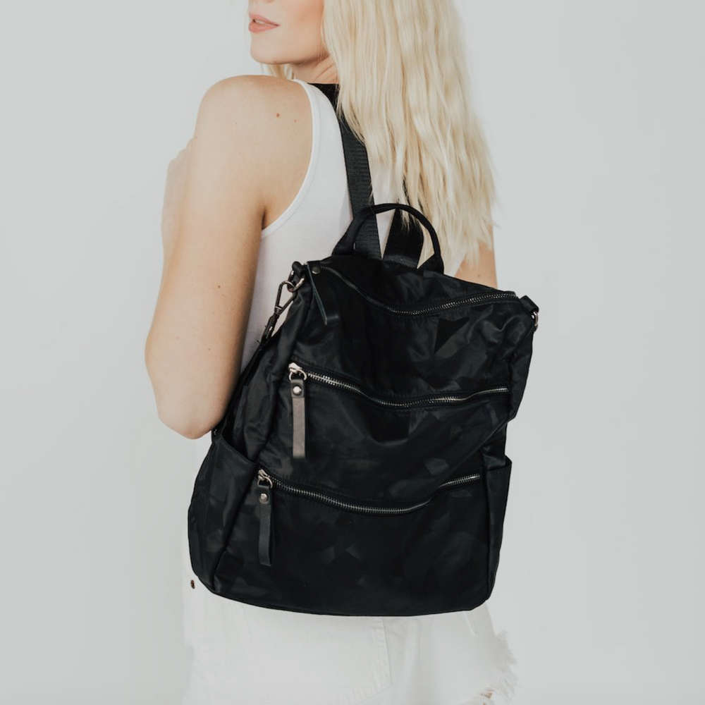 
                      
                        Nori Nylon Backpack
                      
                    